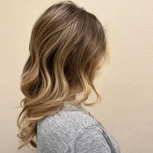 Blonde balayage with soft waves — Hair by Kleo